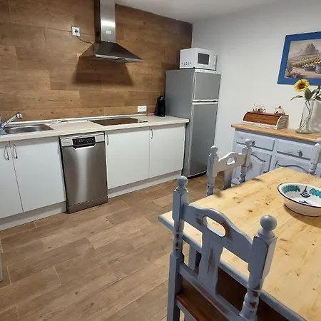 En Poniente Nyaraló *